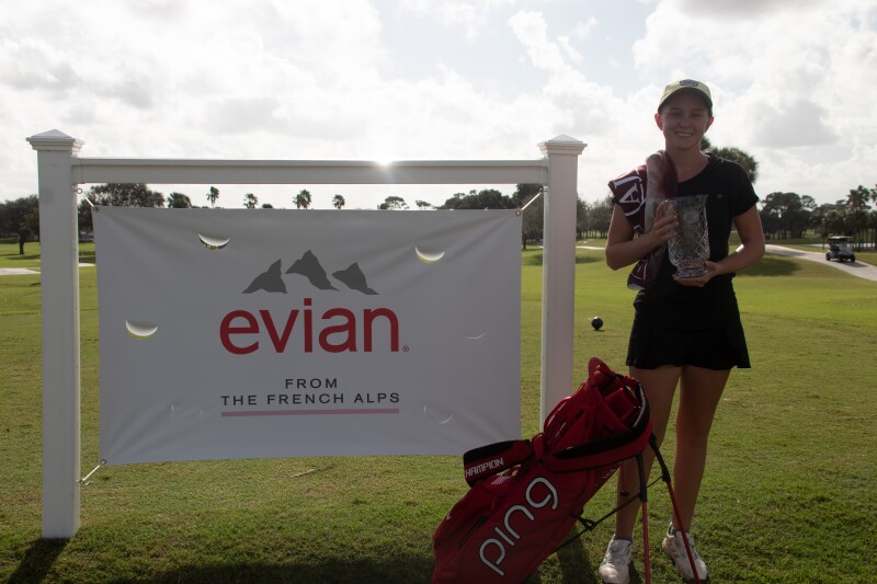 Caroline Patterson Champion photo with ping bag with evian sign - 2020 - evian International and Senior Showcase.jpg