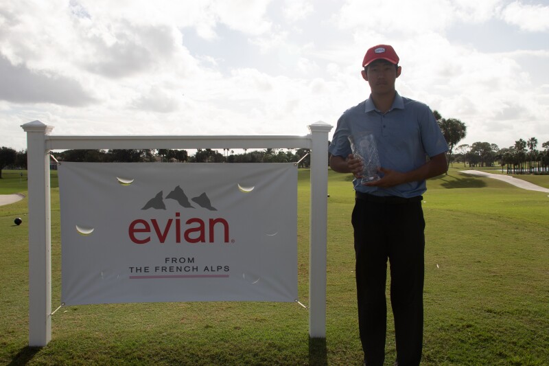 Yuze Zhang champion photo evian sign ajga hat - 2020 - evian International and Senior Showcase.jpg