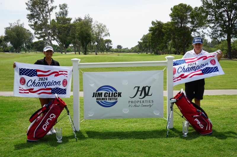 Julia Herzberg and Finn Meister champ photo with bag towels and sign -2024- Jim Click Automotive / HSL Properties championship presented by the Tucson Conquistadores