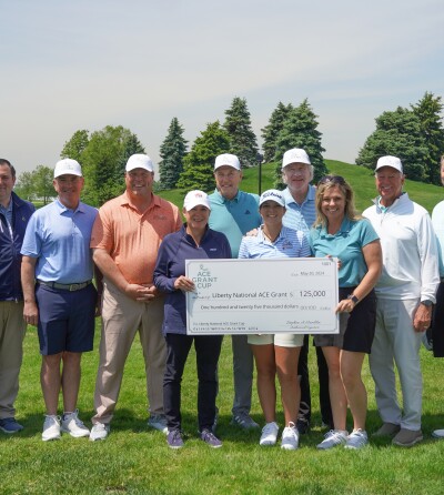 Kevin Rinker, Beth Dockter, Stephen Hamblin, Ryleigh Knaub, and others with ACE grant check - 2024 - Mizuho Americas Open (1).jpg