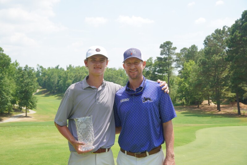 Pierce Adamson and Vaughn Taylor with trophy - 2022 - Vaughn Taylor Championship presented by James Hardie.png