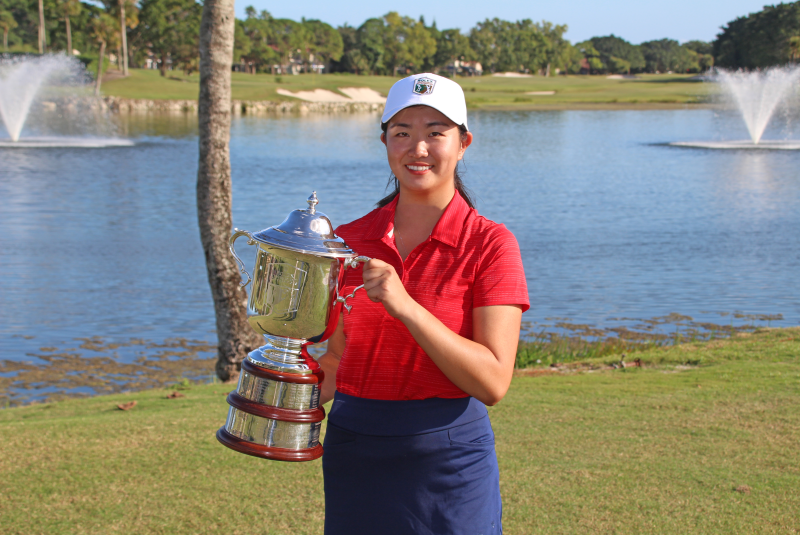 Rose Zhang with AJGA hat holding big trophy - 2020 - Rolex Tournament of Champinos.png