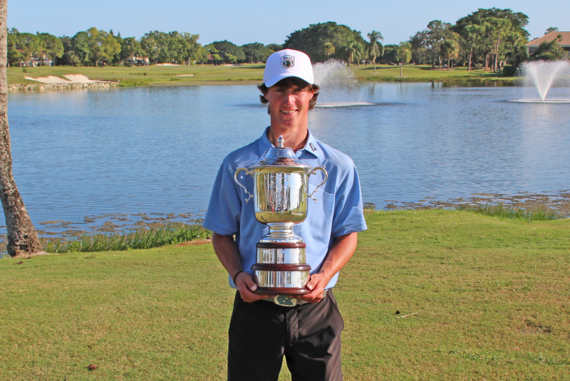 David Ford full body holdin big trophy AJGA hat - 2020 - Rolex Tournament of Champinos.png